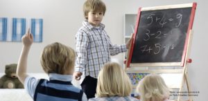 Children at blackboard